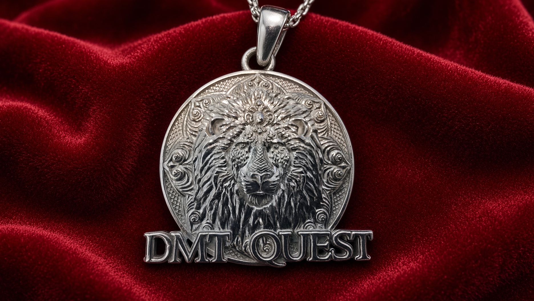 Custom silver DMT Quest medallion featuring a detailed lion design, displayed on red velvet.
